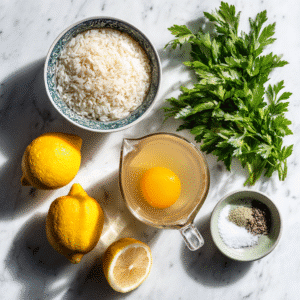Ingredients for Greek Lemon Rice Soup (Avgolemono) including eggs, rice, chicken broth, lemon, and parsley